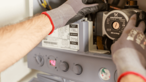 man hands repairing heater